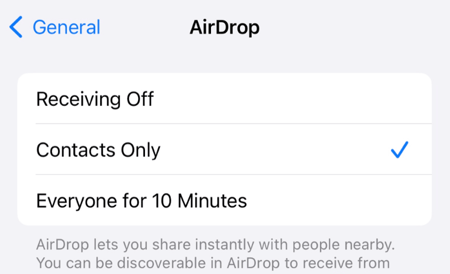 The iPhone AirDrop settings screen with three options, Receiving Off, Contacts Only which is ticked, and Everyone for 10 Minutes